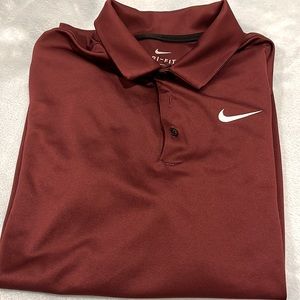Men’s Nike size medium Dri-fit polo in maroon/wine/burgundy color.